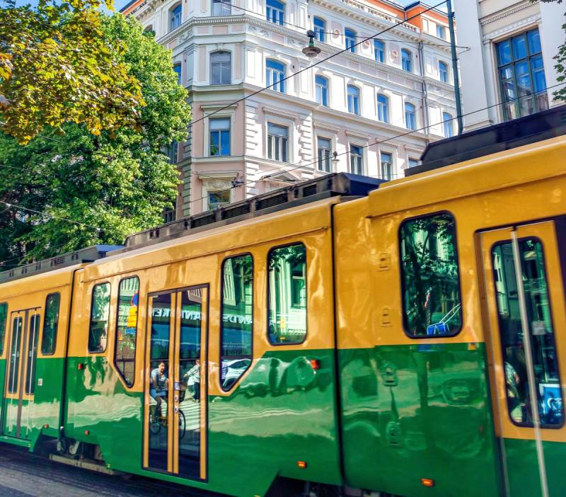 Green and yellow tram in Helsinki